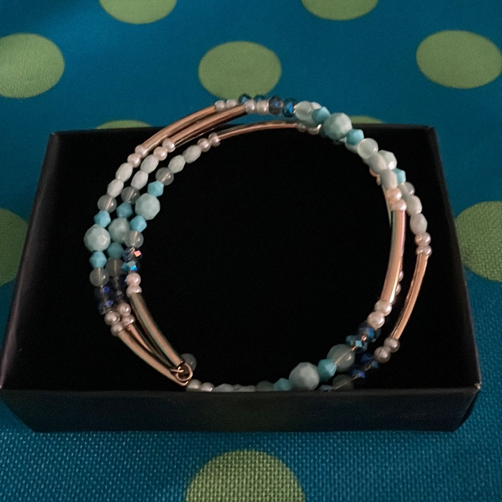 Avon golden mustang wrap bracelet.